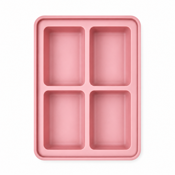 Pink 4-compartment silicone freezer tray for baby food and soup portions, overhead view