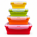 Four collapsible silicone food containers stacked in a tower
